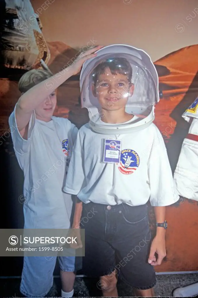 Children try on $1 million spacesuit at Space Camp, George C. Marshall Space Flight Center, Huntsville, AL