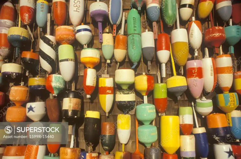 Colorful buoys displayed on  wall