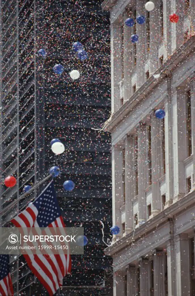 American flag and confetti at Tickertape Parade, New York