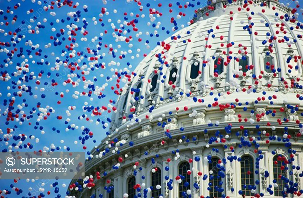 This is the U.S. Capitol during the Bicentennial of the Constitution Celebration. There are red, white and blue balloons falling around the Capitol Dome. It marks the dates that commemorate the Centennial 1787-1987.