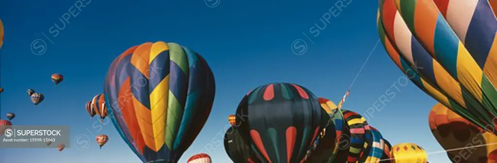 This is the 25th Annual Albuquerque International Balloon Fiesta. It shows the mass ascension of colorful balloons.