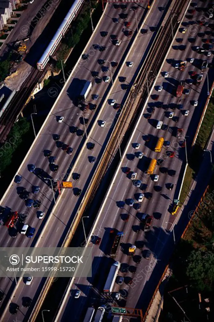 This is an aerial view of the Interstate Highway 90/94 during rush hour traffic. It is the morning rush hour during summer.