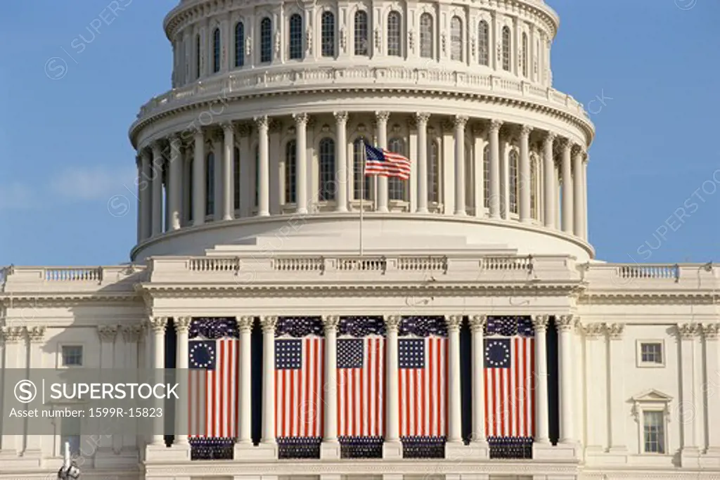 Capital Building draped with US flags, Washington, DC