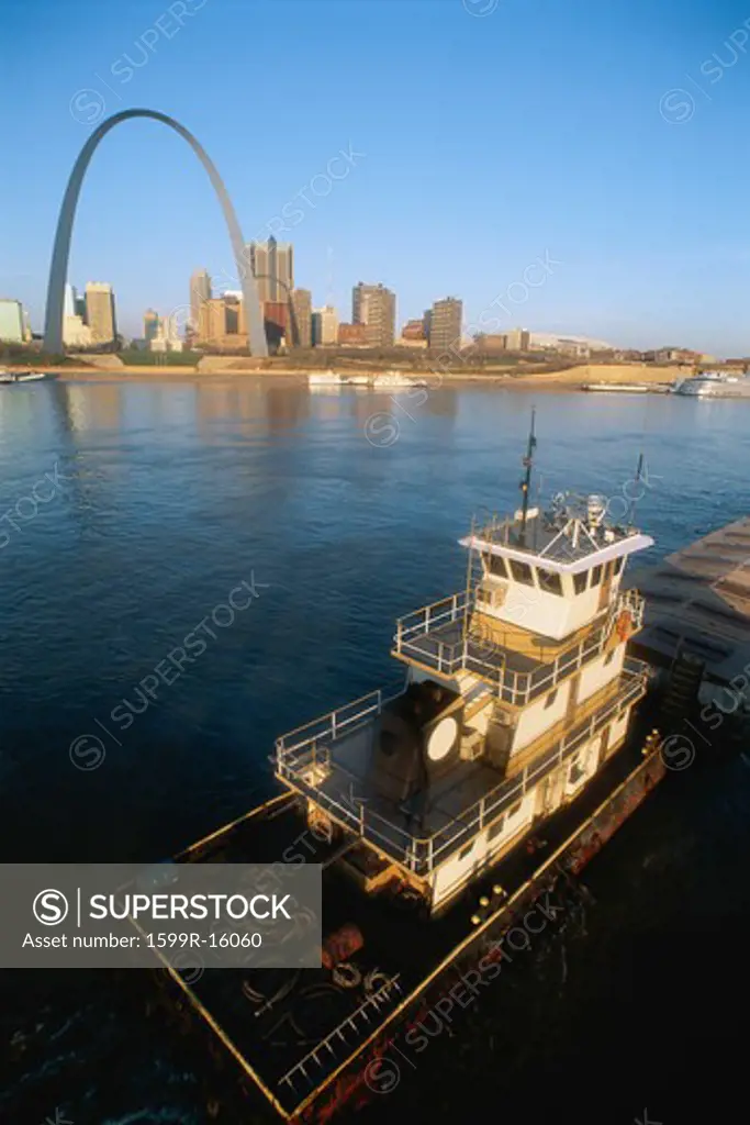 Barge on Mississippi River, St. Louis beyond