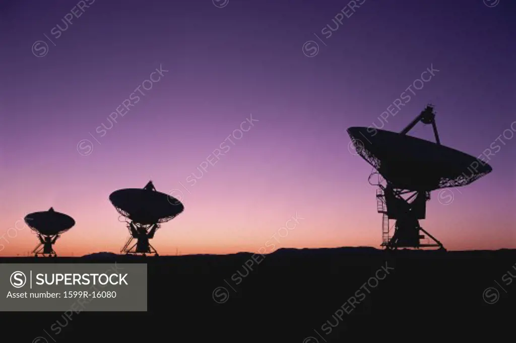 VLA Very Large Array radio telescope dish field in twilight