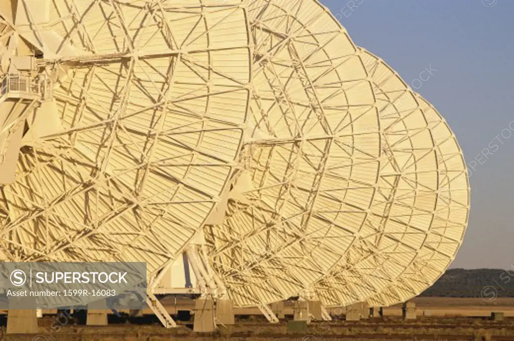 Row of VLA Very Large Array radio telescope dishes