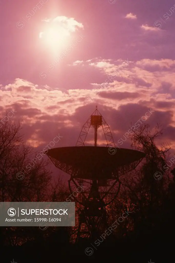VLA Very Large Array radio telescope dishes against purple sky