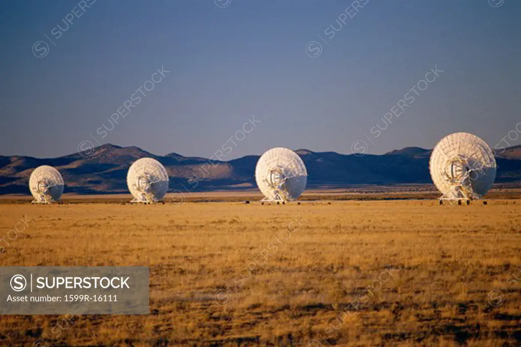 VLA Very Large Array radio telescope dishes scattered in field