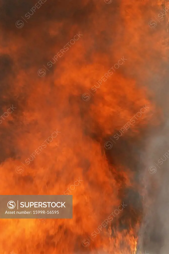 Raging fire and billowing smoke