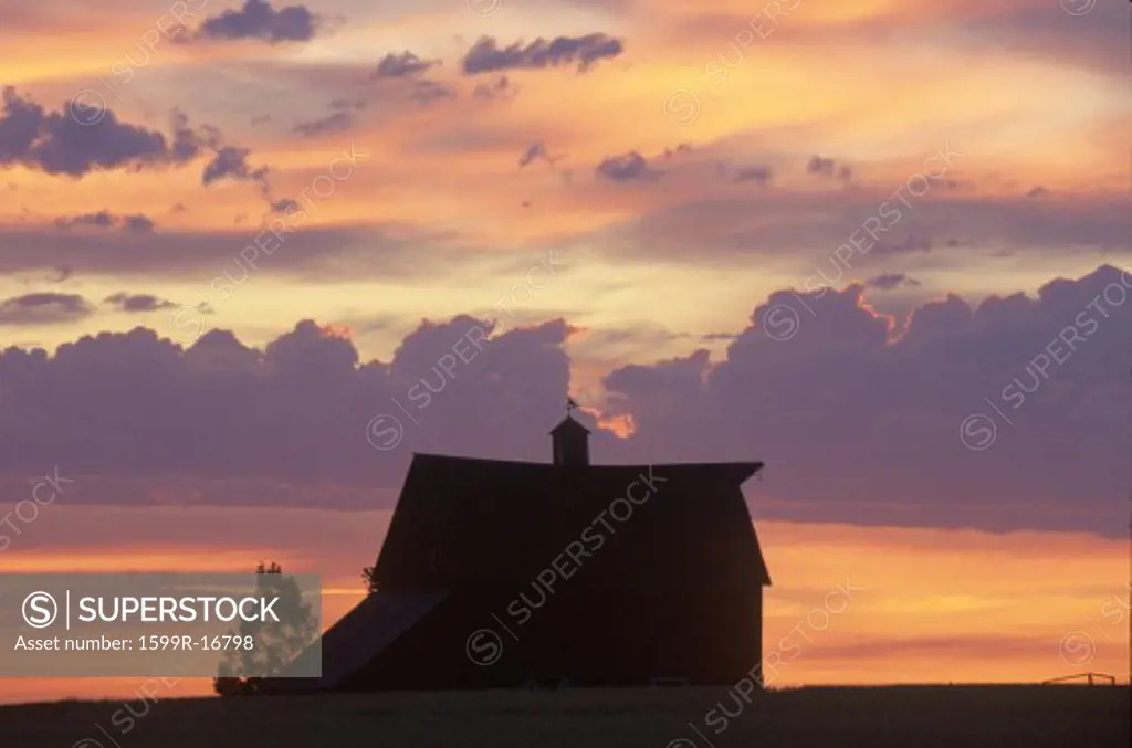 Barn at sunset in silhouette, Davenport, WA