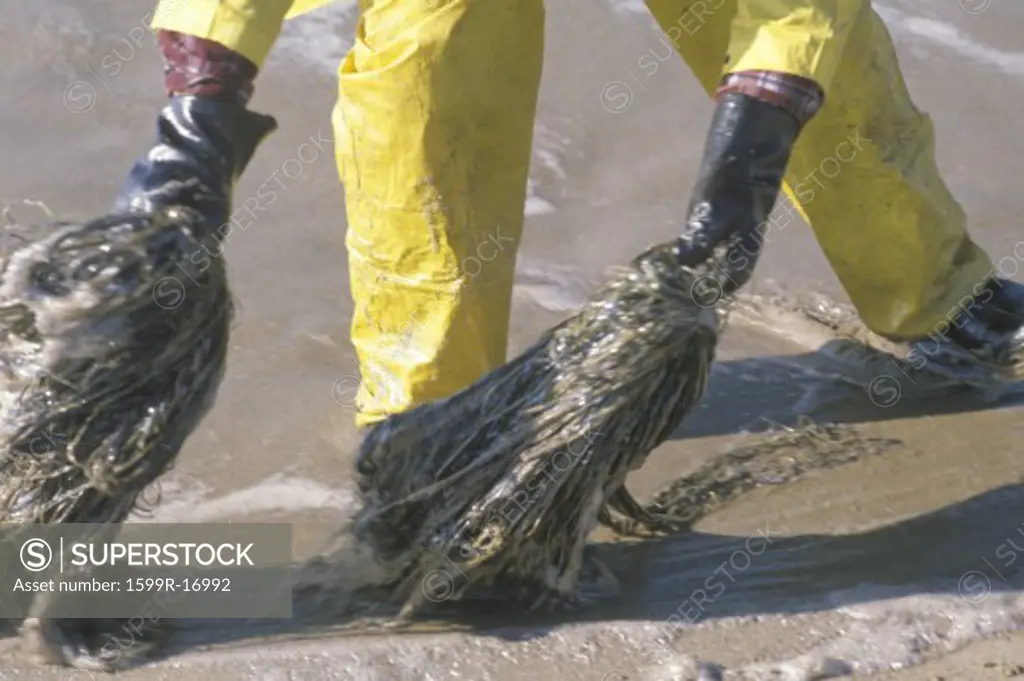 A close-up of a man participating in an environmental clean up in Huntington Beach, California