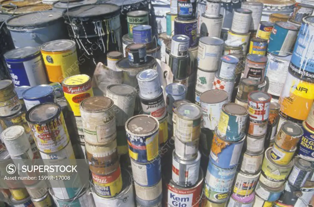 Stacks of toxic paint cans waiting for disposal at a Wilmington Unocal station in Los Angeles, CA