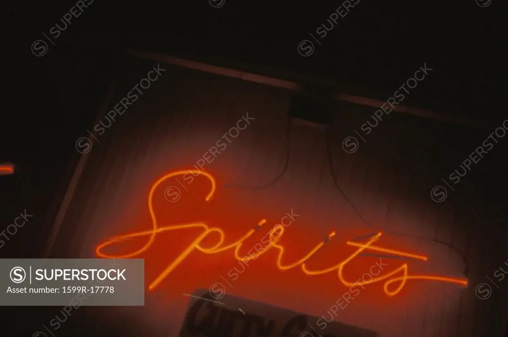 A neon sign that reads Spirits