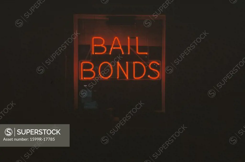 A neon sign that reads Bail Bonds