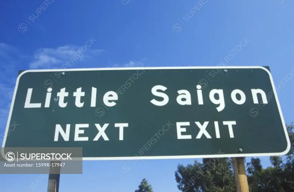 A sign that reads Little Saigon Next Exit