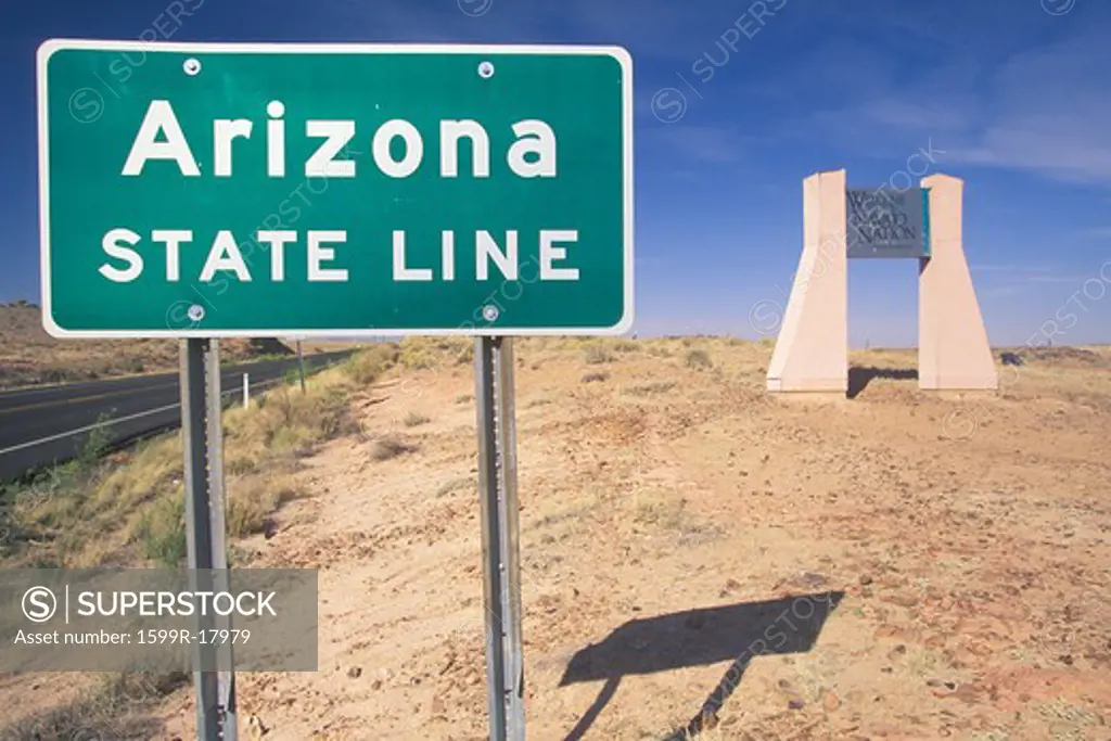A sign that reads Arizona State Line