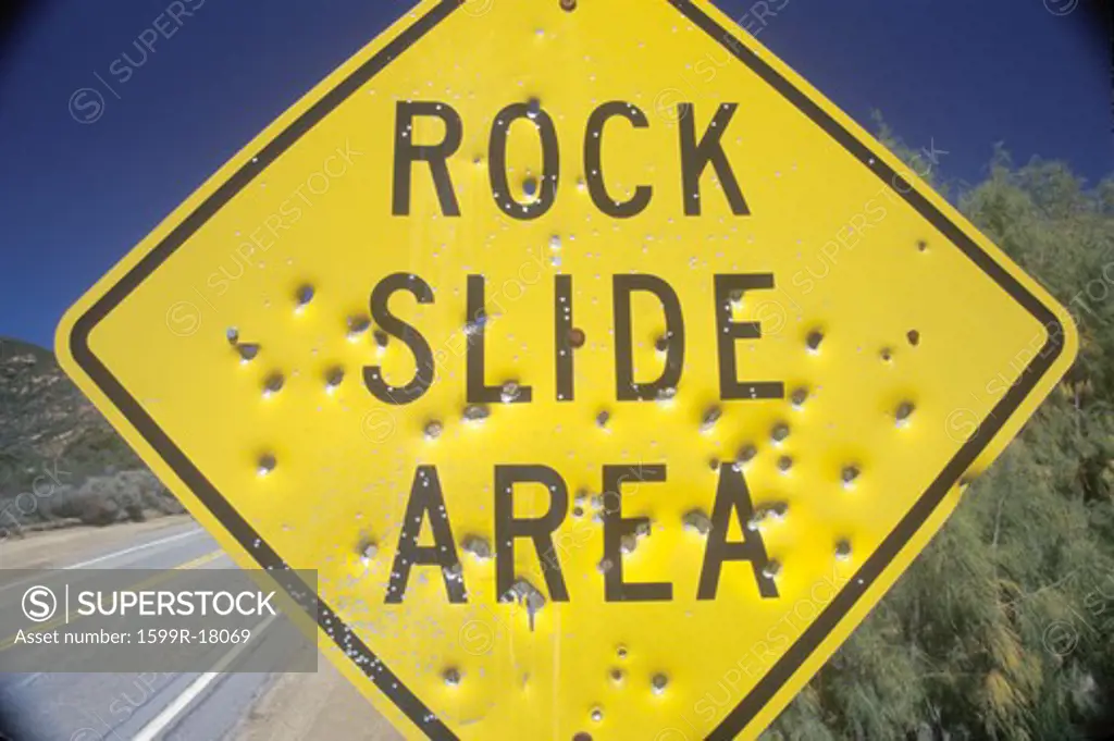A sign that reads Rock Slide Area