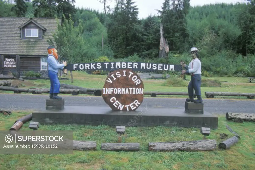 A sign that reads Forks timber museum visitor information center