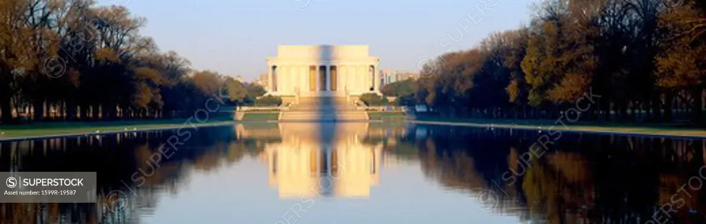 Lincoln Memorial in shadow of Washington Monument at dusk, Washington DC