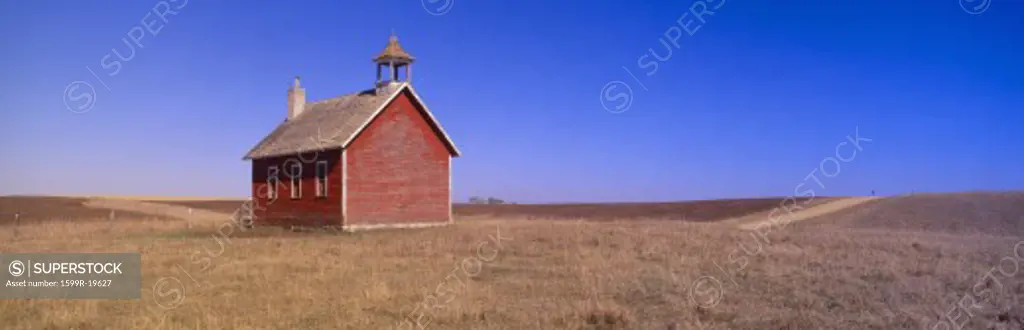 Old Red Schoolhouse on prairie, Battle Lake, Minnesota