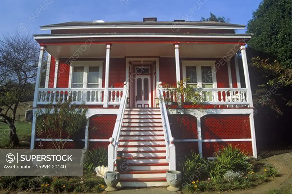 Red  residence with white trim, CA