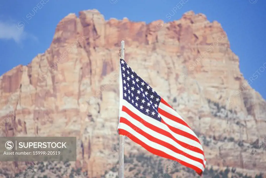American Flag Flying in front of Mountain, Southwest United States