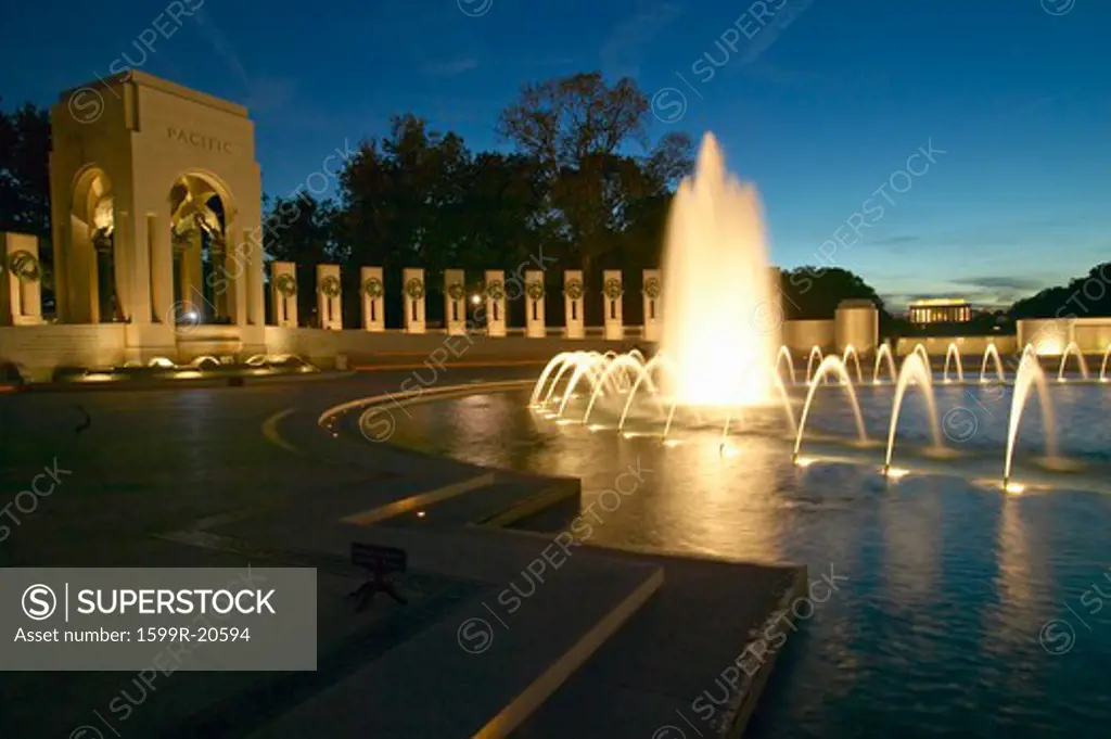 Fountains at the U.S. World War II Memorial commemorating World War II in Washington D.C. at dusk