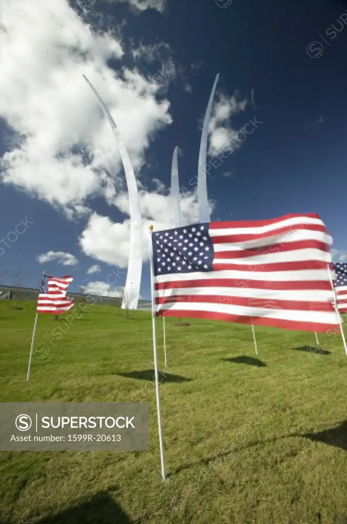American flags at base of three soaring spires of the Air Force Memorial at One Air Force Memorial Drive, Arlington, Virginia in Washington D.C. area
