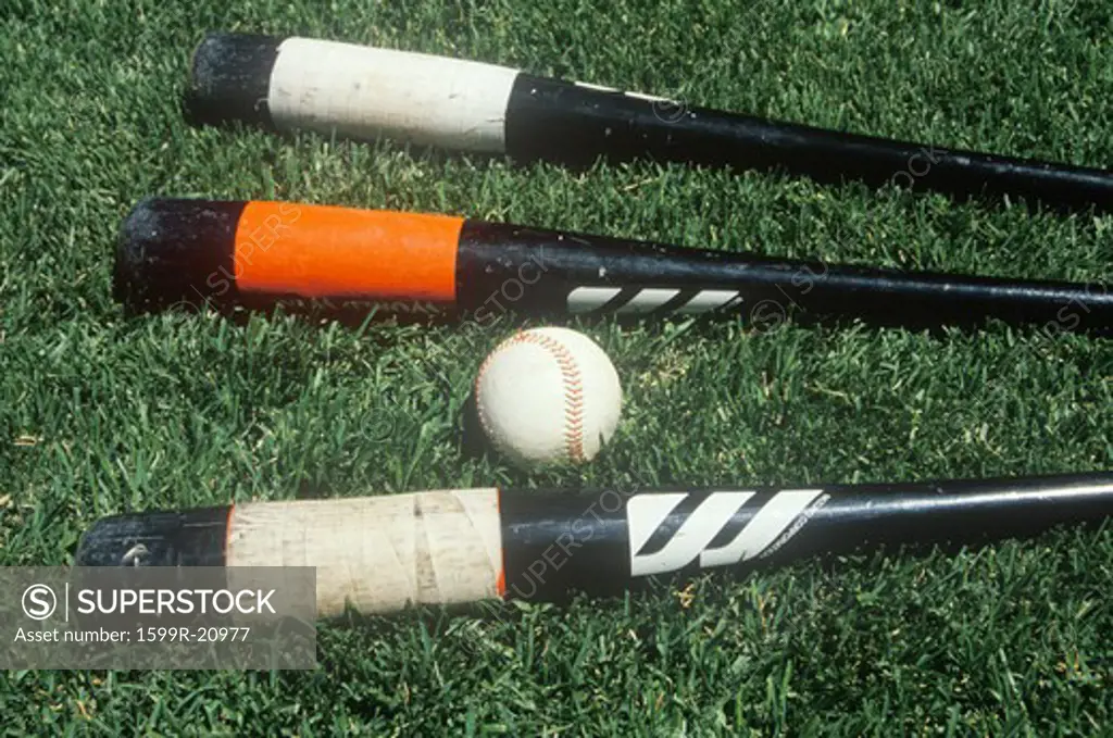 Baseball bats and ball on field, Candlestick Park, San Francisco, CA