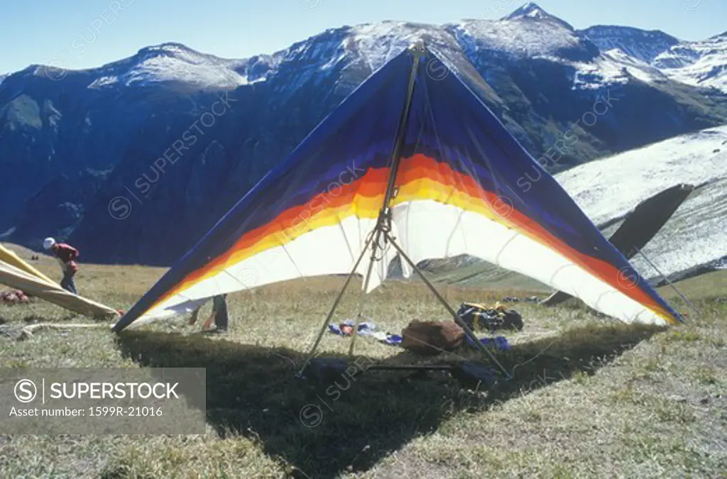 Hang glider on ground with mountains in background, Hang Gliding Festival, Telluride, Colorado