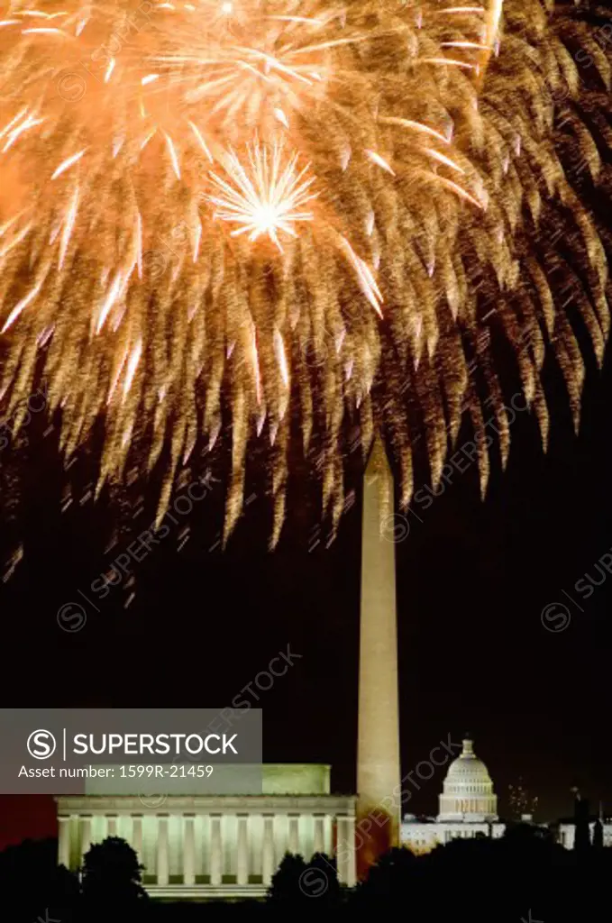 Fourth of July celebration with fireworks exploding over the Lincoln Memorial, Washington Monument and U.S. Capitol, Washington D.C.