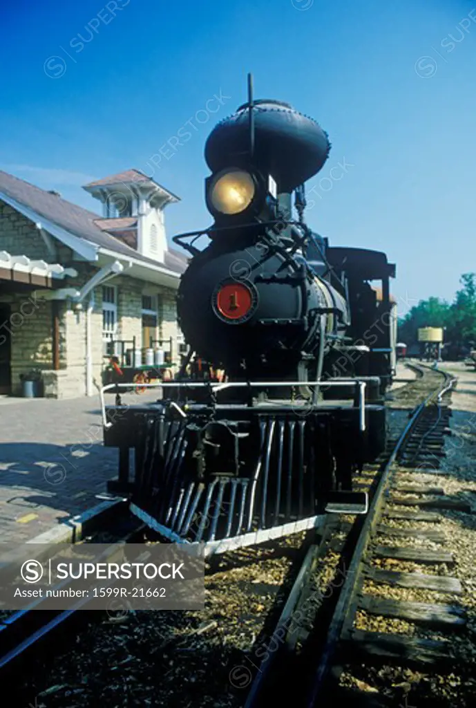 A steam engine at a train station in Eureka Springs, Arkansas