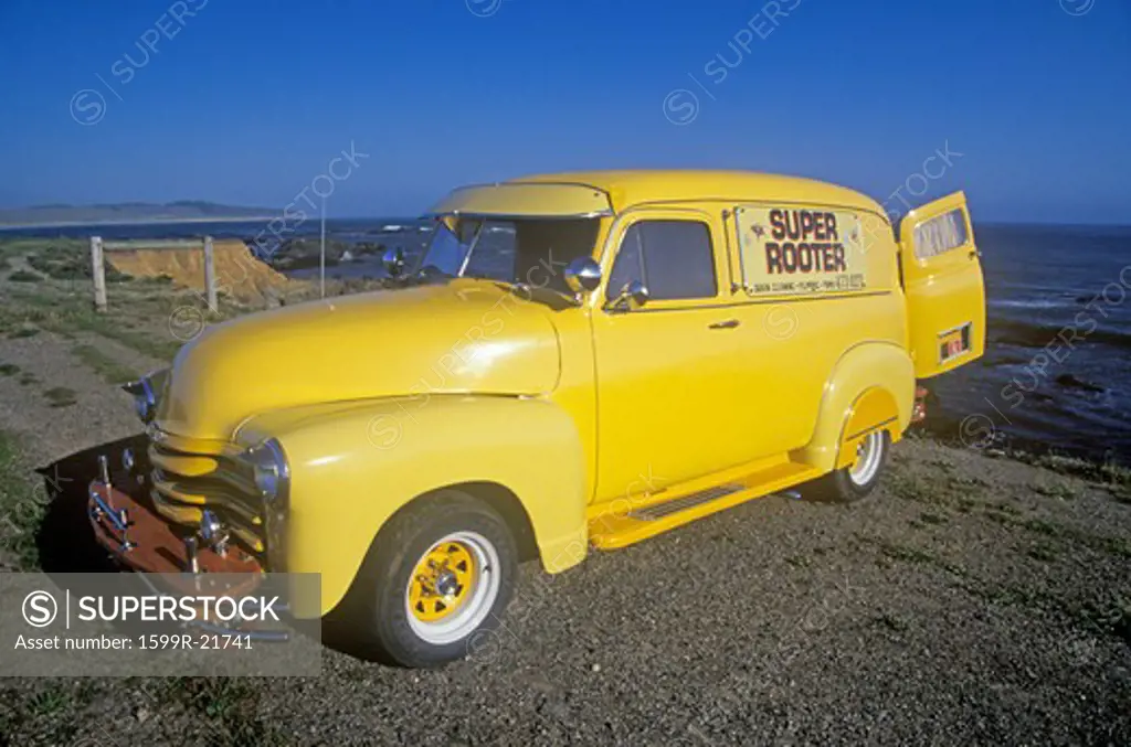 A yellow truck on the Pacific Coast Highway, California
