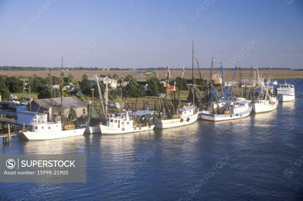 A line of shrimp fishing boats in the Intercoastal Waterway in Northern Carolina