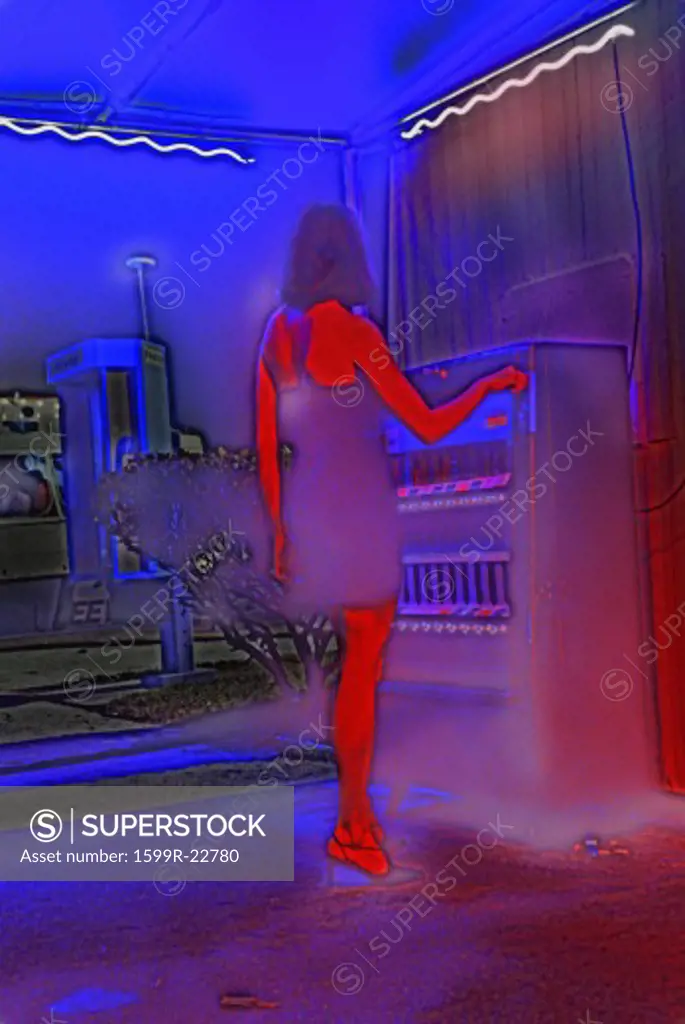 A woman at a cigarette machine in a digitally altered nightclub scene from set of 'Temptation', feature film, Miami, FL