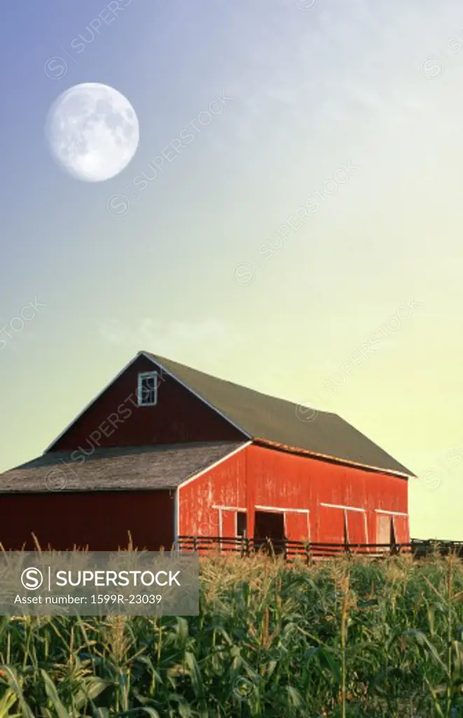 Photo montage: Red barn and corn field under a full moon