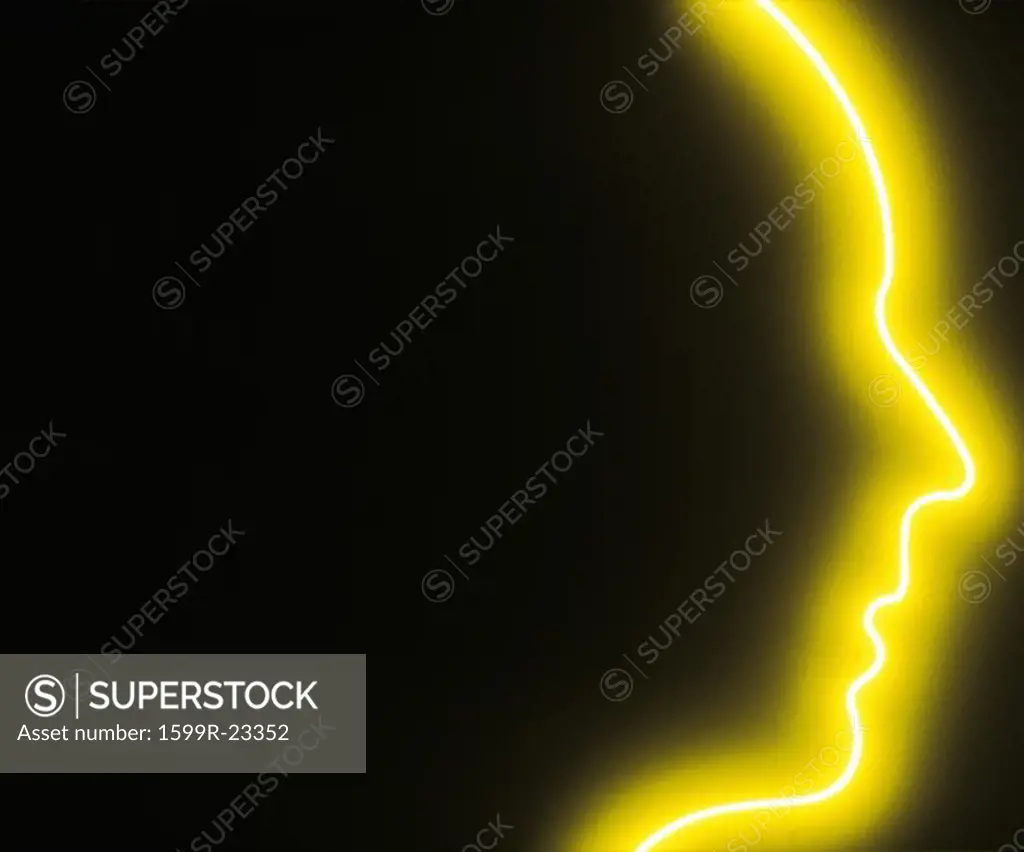 A glowing yellow outline of a face