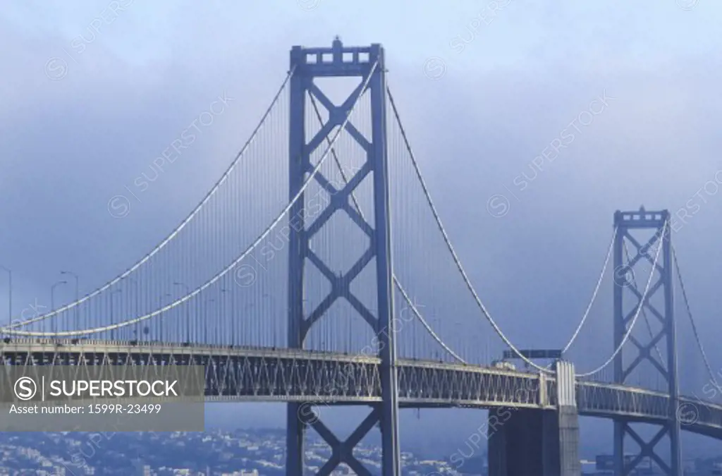 Fog enshrouded San Francisco and Bay Bridge as seen from Treasure Island, California