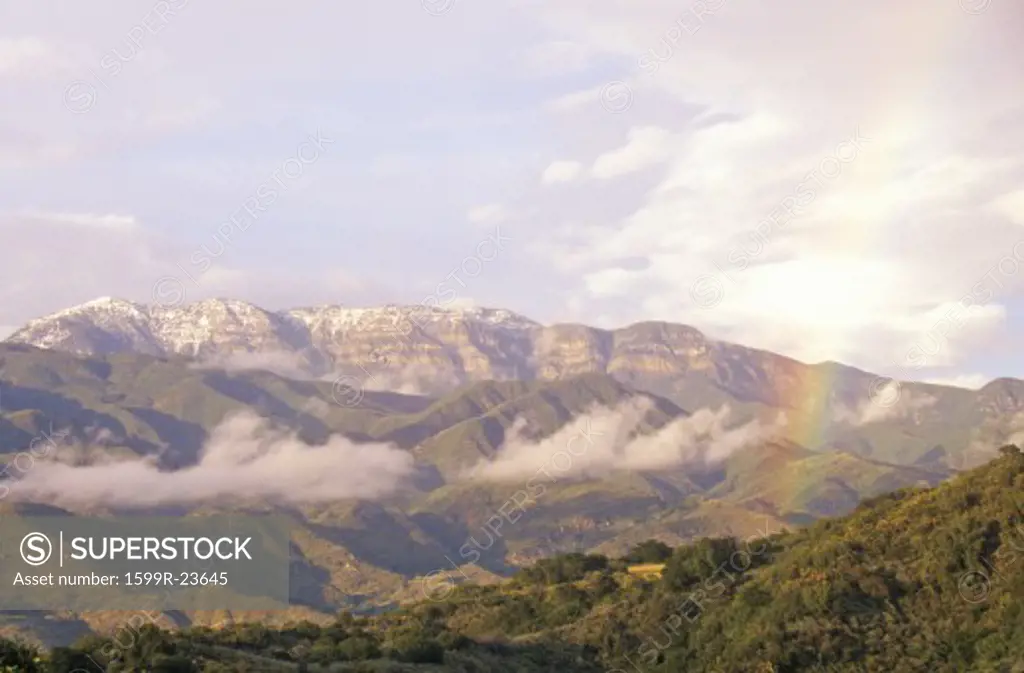 Rainbow and clouds over the Topa Topa Mountains in Ojai, California