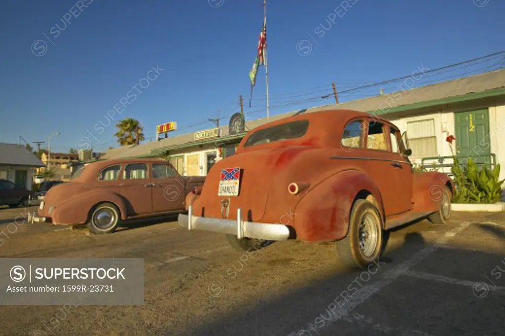 Historic vintage roadside motel on old Route 66 welcomes old cars and guests in Barstow California