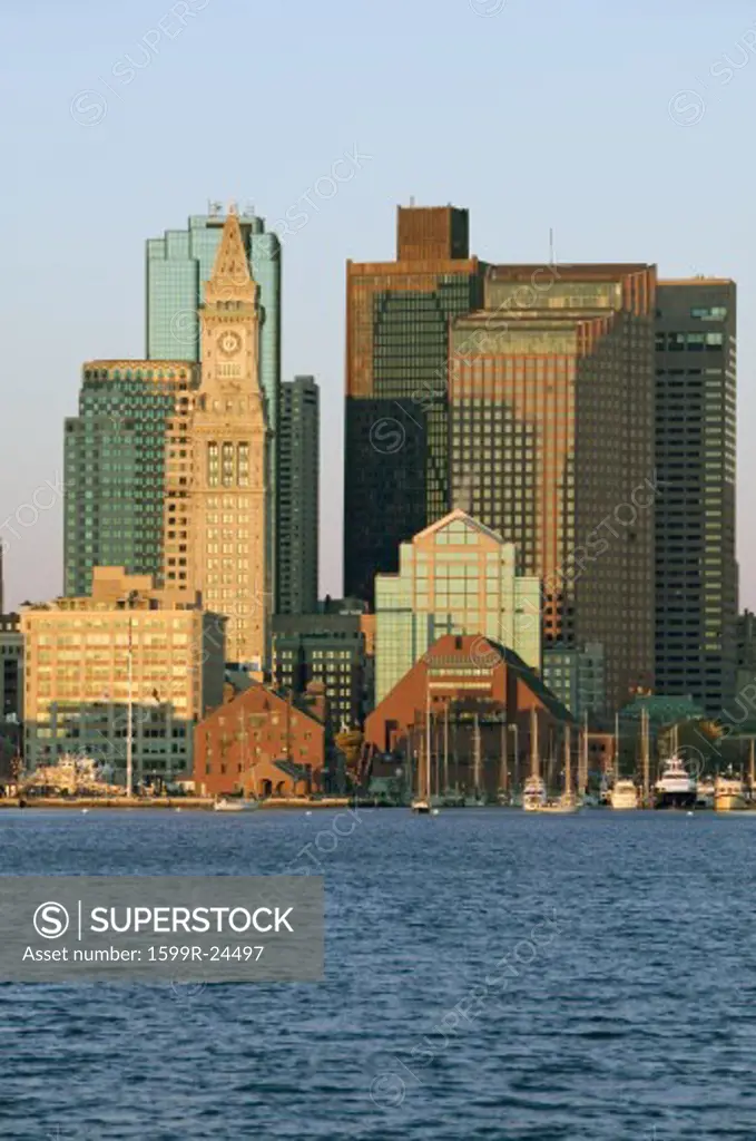 Boston Harbor and the Boston skyline at sunrise as seen from South Boston, Massachusetts, New England