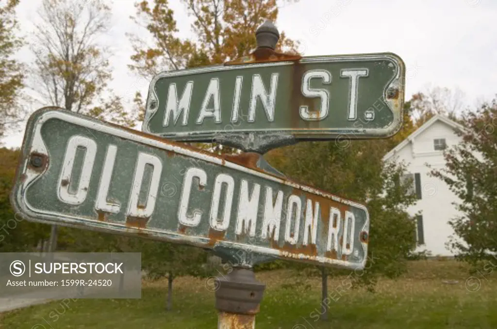 Main Street USA and Old Common Road sign in autumn, western Massachusetts, New England