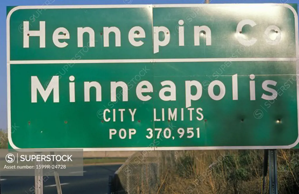 Road sign of Minneapolis, MN and Hennepin