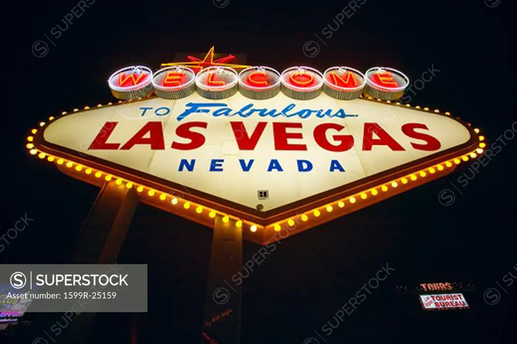 Colorful sign reads Welcome to Fabulous Las Vegas, Nevada at night