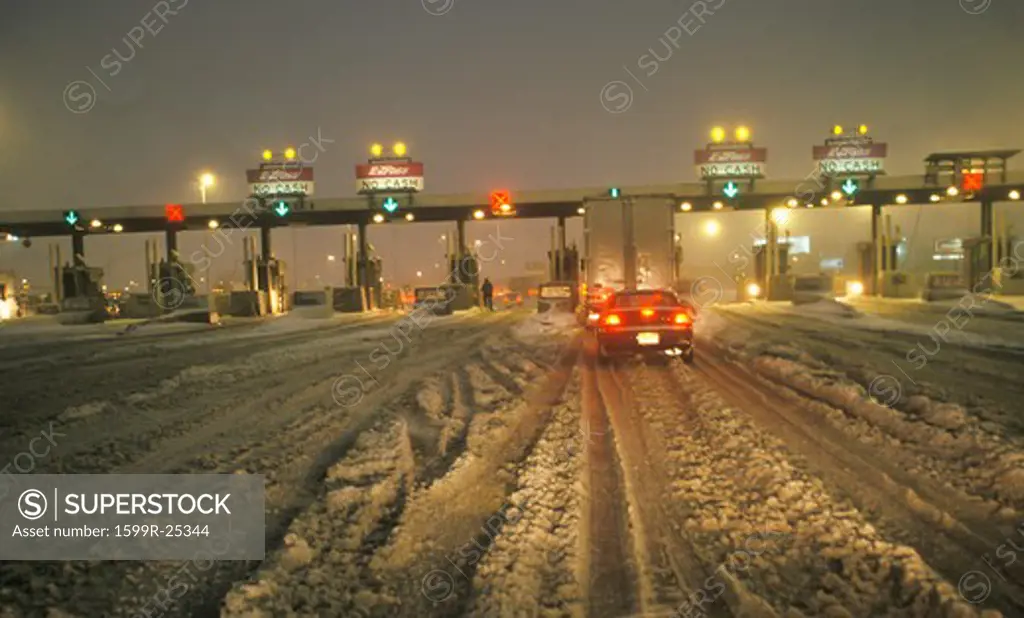 Toll gate in New Jersey after winter snowstorm and much snow at night