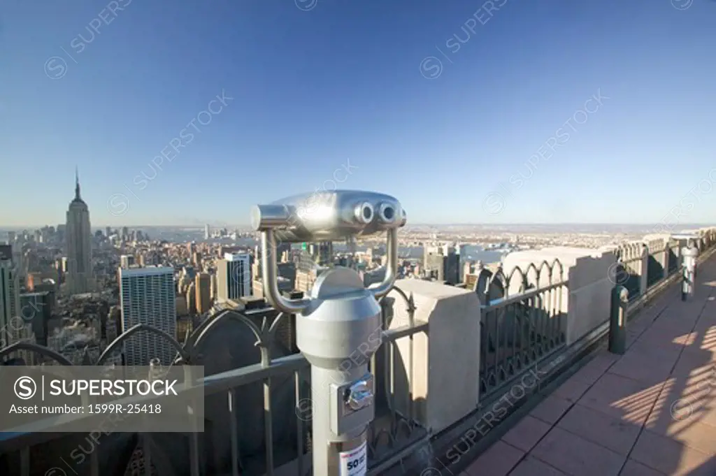 Viewer scope to look at panoramic view of New York City from Top of the Rock viewing area at Rockefeller Center, New York City, New York