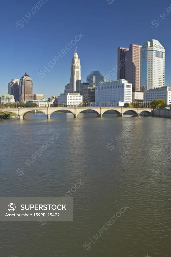 Scioto River and Columbus Ohio skyline in autumn, with setting sunlight