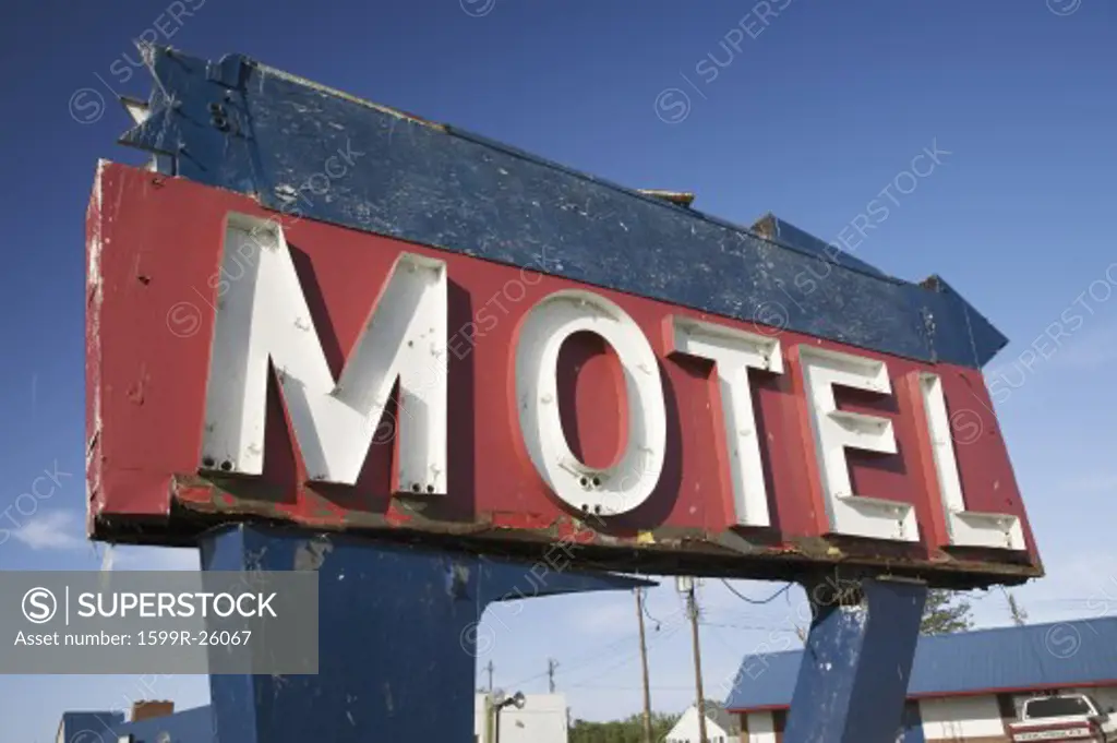 Deserted motel sign rotting away on Route 13 on the Eastern Shore of Maryland