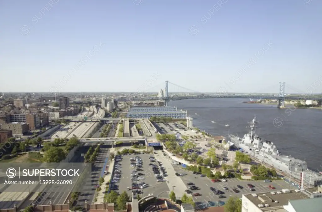 Aerial view of Delaware River, Benjamin Franklin Bridge and waterfront of Philadelphia, Pennsylvania shot from Penns Landing