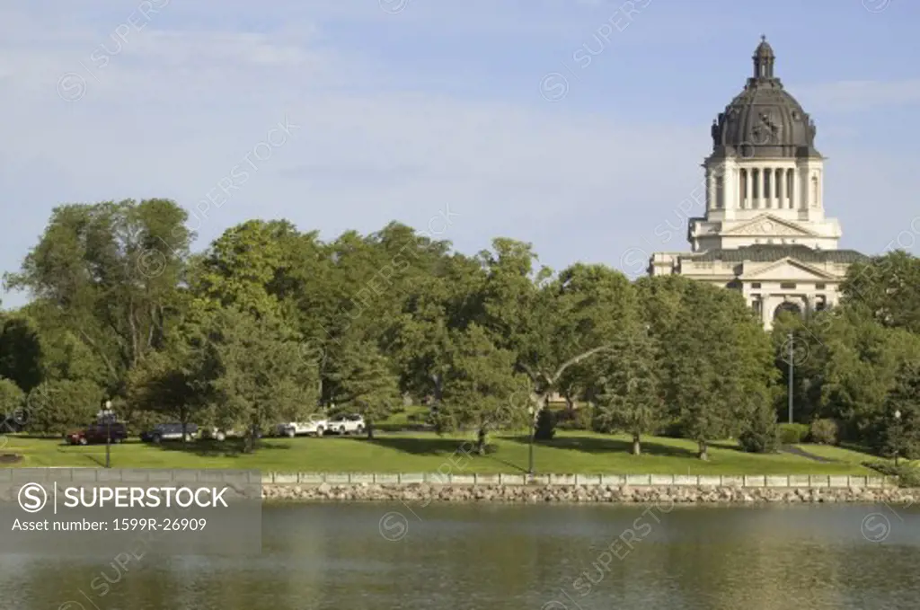 Lake with view of South Dakota State Capitol and complex, Pierre, South Dakota, built between 1905 and 1910